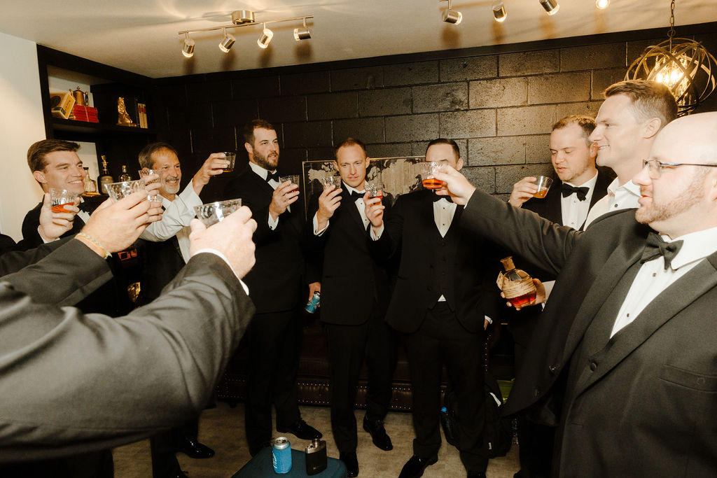 groomsman toasting before wedding ceremony