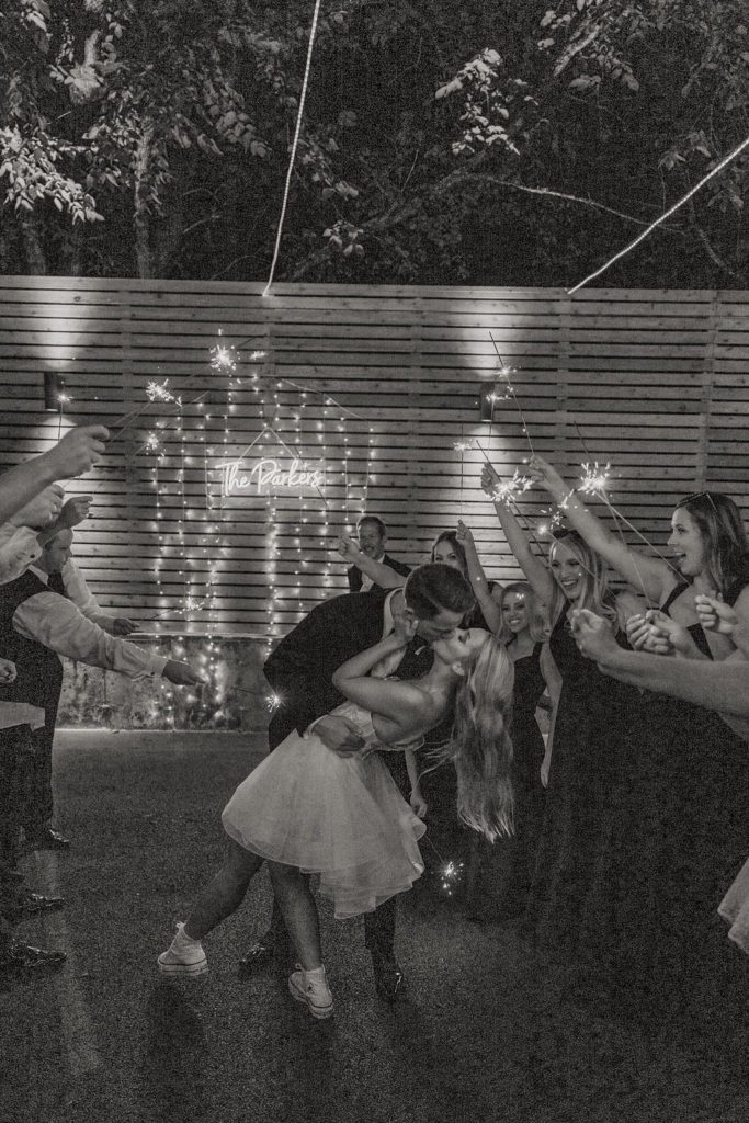 bride and groom sparklers exit after wedding reception