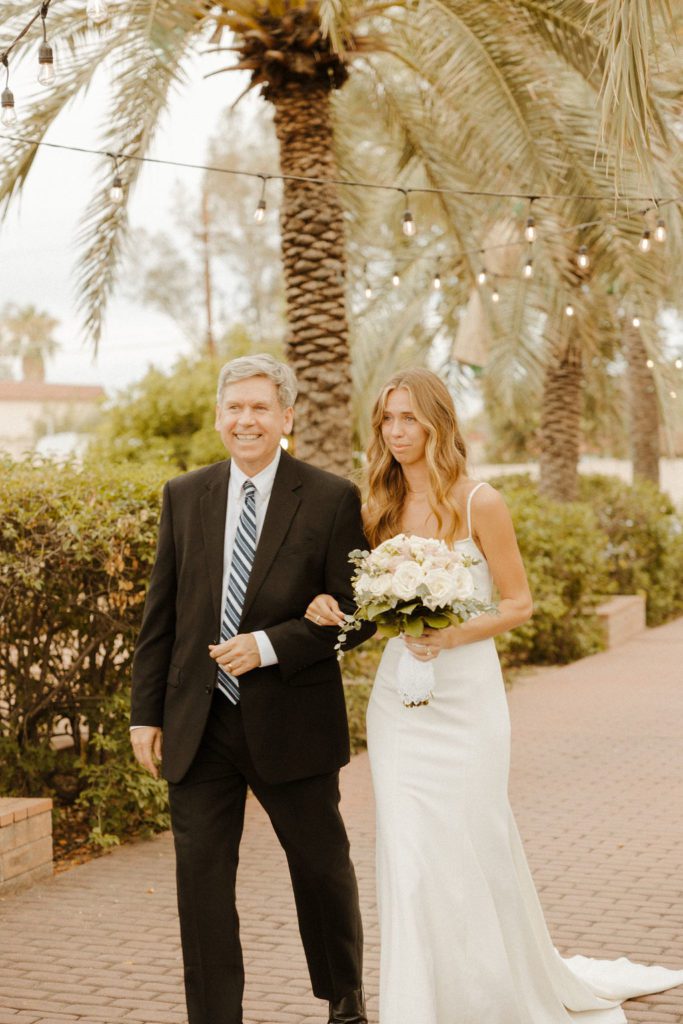 bride and father of bride walking down the aisle photographed by phoenix wedding photographer 