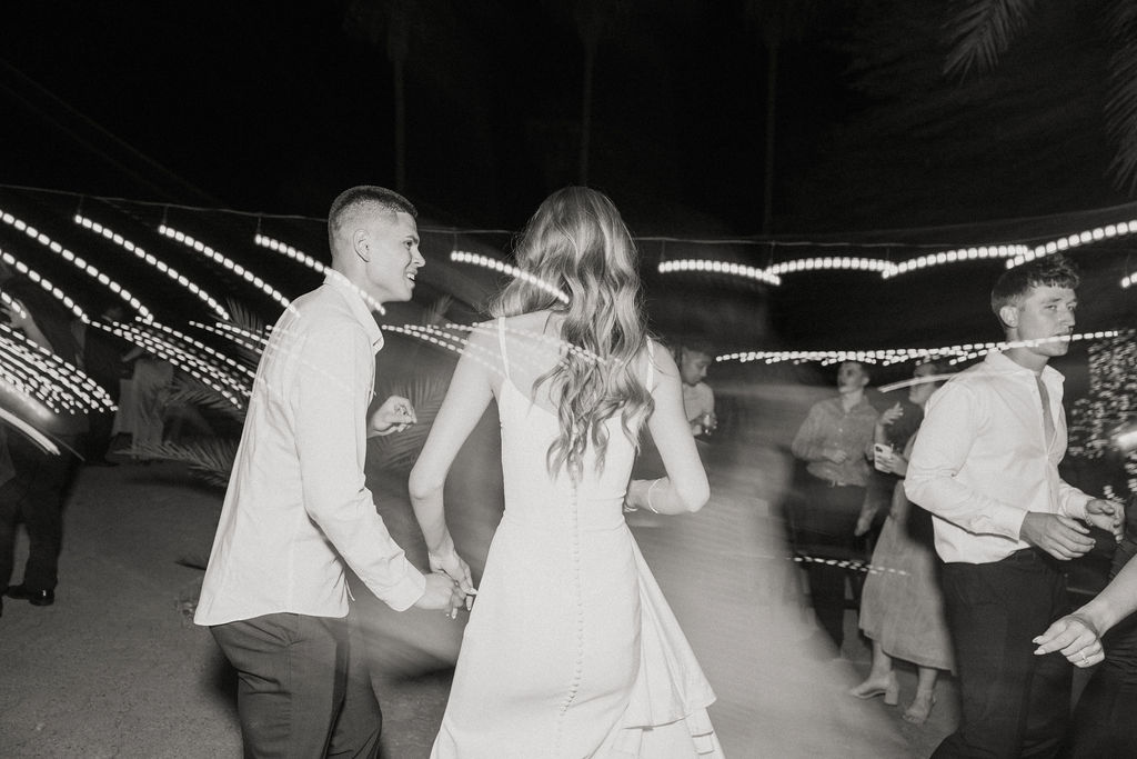 groom and bride dancing at reception photographed by phoenix wedding photographer